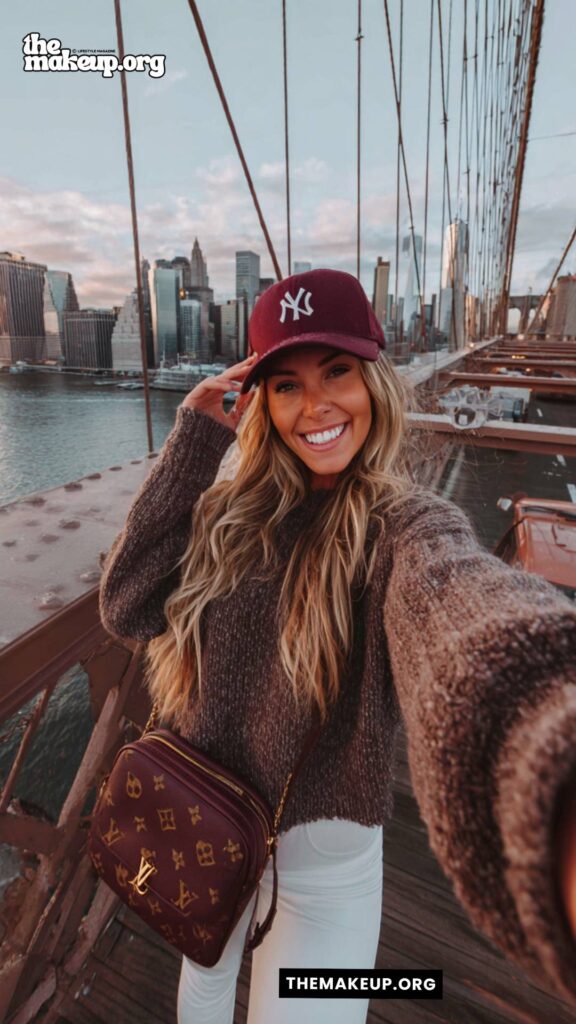 Textured Sweater and Burgundy Cap — cozy fall look on nyc bridge
