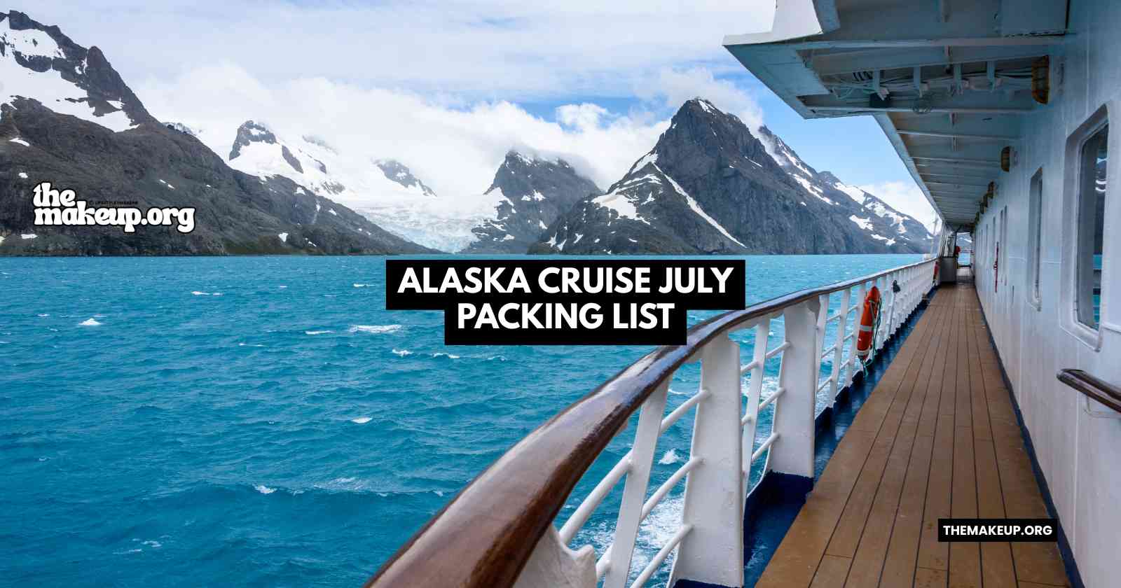 Woman packing layers and rain gear for an Alaska cruise in July, open suitcase on bed